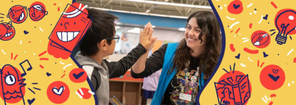 A child and a woman in a blue vest are giving each other a high-five. There is an orange background with red circles illustrations of lightbulbs and books.