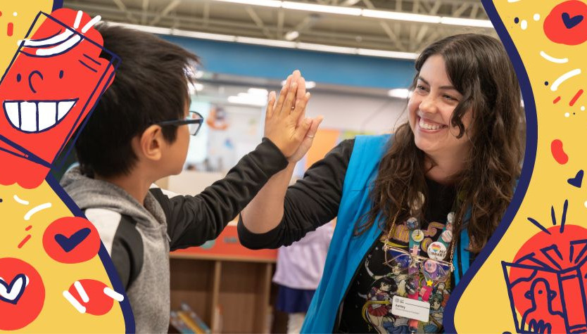 A child and a woman in a blue vest are giving each other a high-five. There is an orange background with red circles illustrations of lightbulbs and books.