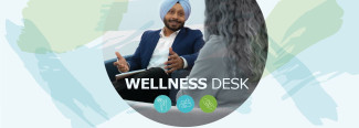 A photograph of a man sitting with a pen and notebook and talking to a woman. Wellness Desk is written over the image, and underneath is a visual of three different dots with icons inside them.