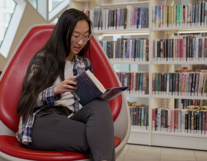 background image: teen reading